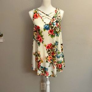Very long sleeveless high-low top